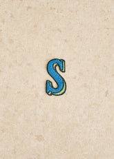 Green / blue badge