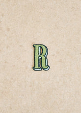 Green / blue badge