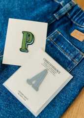 Green / blue badge
